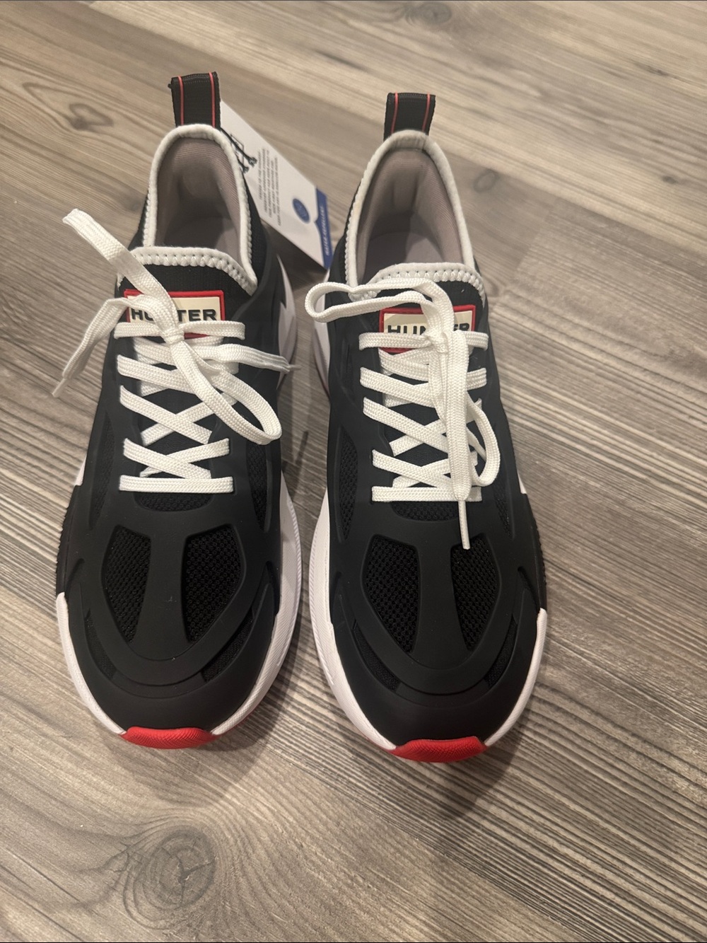 Hunter women’s  tulip sneaker Black and White Sneakers with Red Trim
